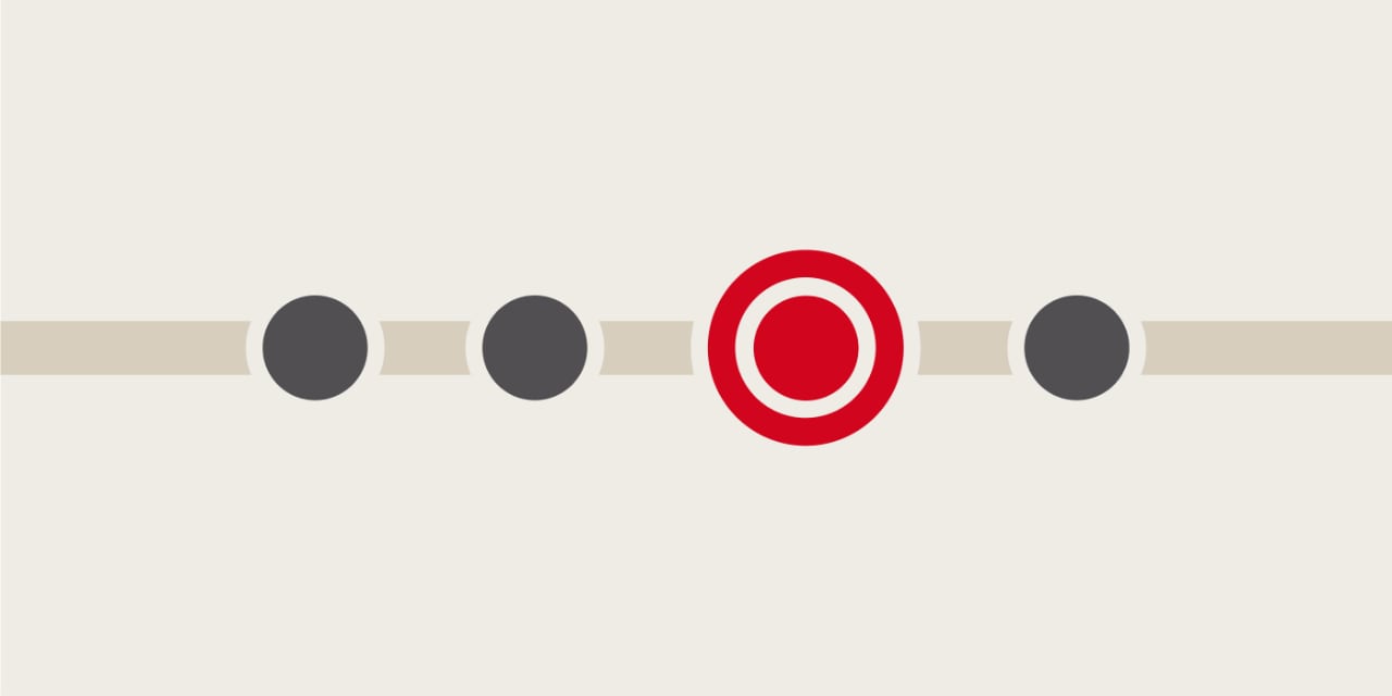 Illustration von vier ausgefüllten Kreisen, die auf einer horizontalen Linie angeordnet sind. Der zweite Kreis von rechts ist als einziger rot eingefärbt und wird von einer roten Linie umrandet.  