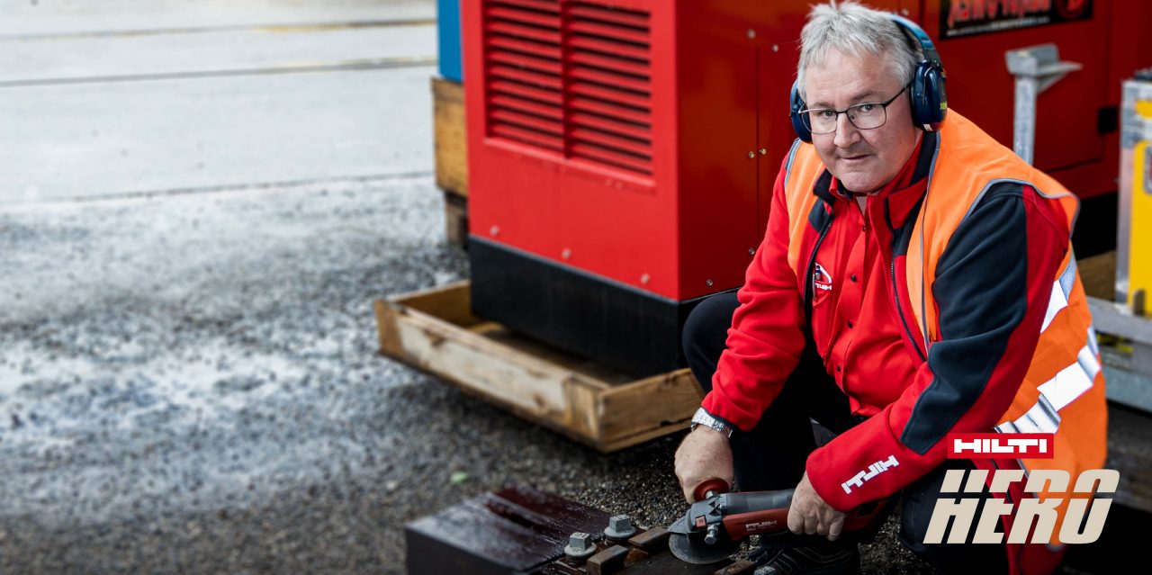 Hilti Verkaufsberater mit Polieren auf Baustelle
