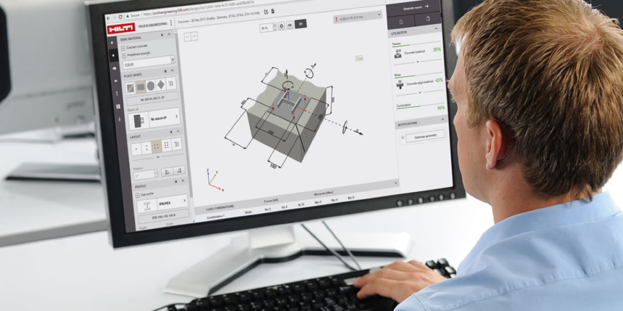 Eine Person bei der Planung und Bemessung mit der PROFIS Software am Computer